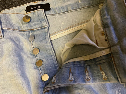 Amiri Distressed Light Wash Jeans-yf