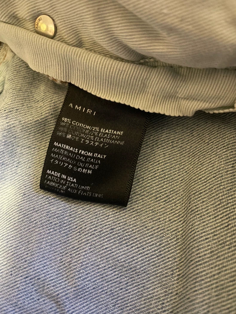 Amiri Distressed Light Wash Jeans-yf