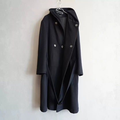 Yohji Yamamoto With A Regulation Boxer's robe And A Belted Coat