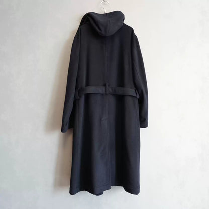 Yohji Yamamoto With A Regulation Boxer's robe And A Belted Coat