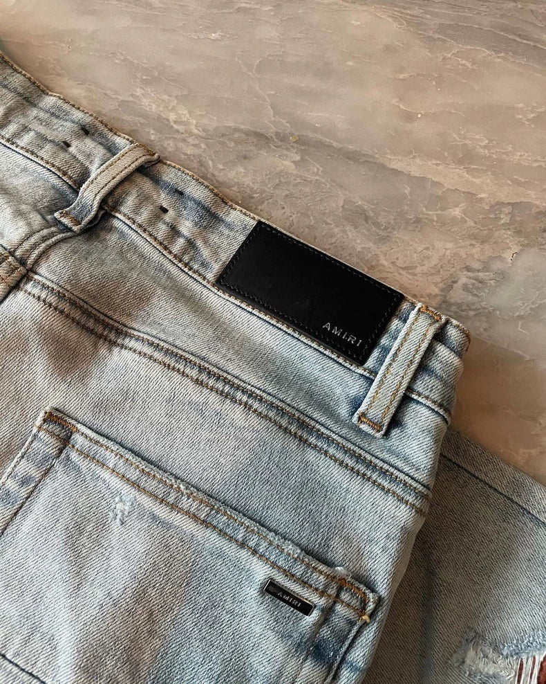 Amiri Orange Tie-Dye Patchwork Denim Pants