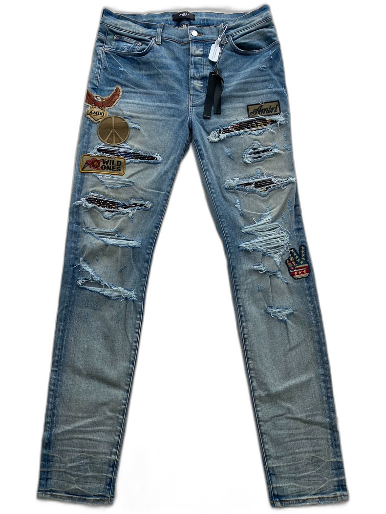 Amiri Distressed Denim Pants with Patches