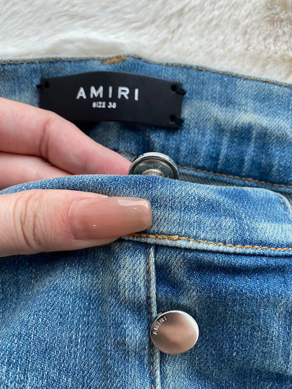 Amiri Distressed Denim Pants with Patches