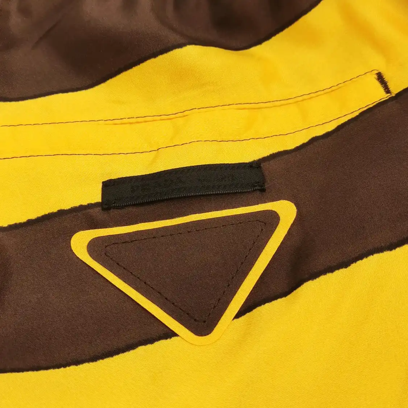 Prada Yellow Striped Silk Shorts for Men
