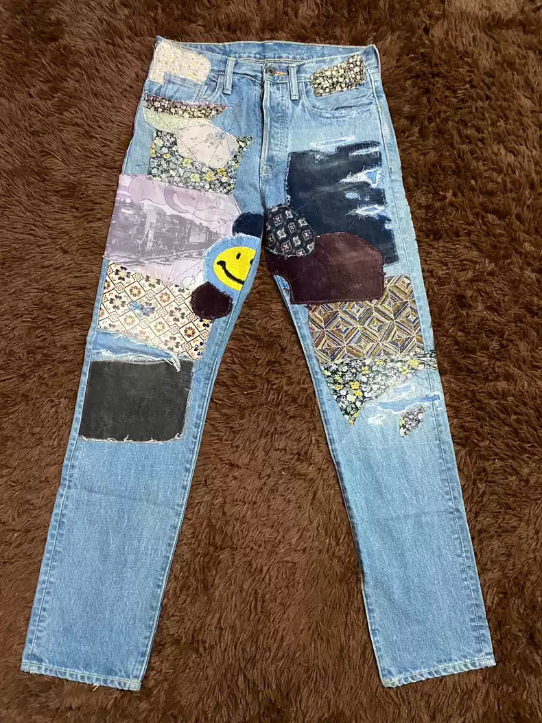 kapital Patched jeans with flowers and random stitches