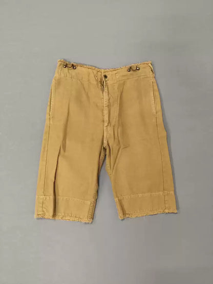 kapital Brass suspenders hook waist shorts.