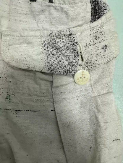 kapital Graffiti to make old slogan printed linen shorts