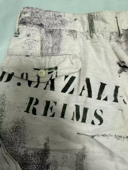 kapital Graffiti to make old slogan printed linen shorts