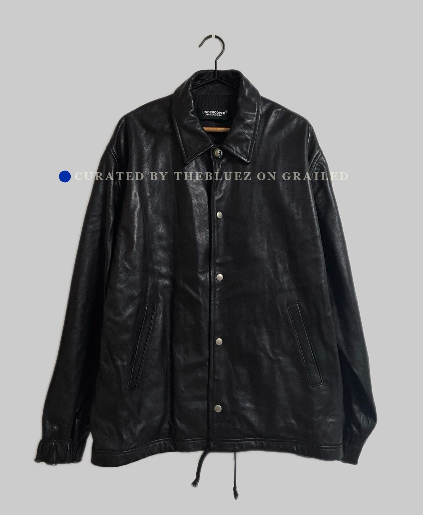 UNDERCOVER Eye Button Oversized Leather Jacket
