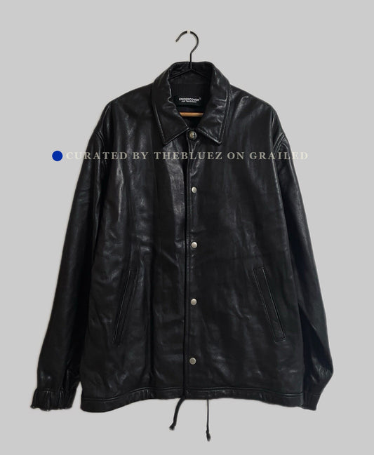 UNDERCOVER Eye Button Oversized Leather Jacket