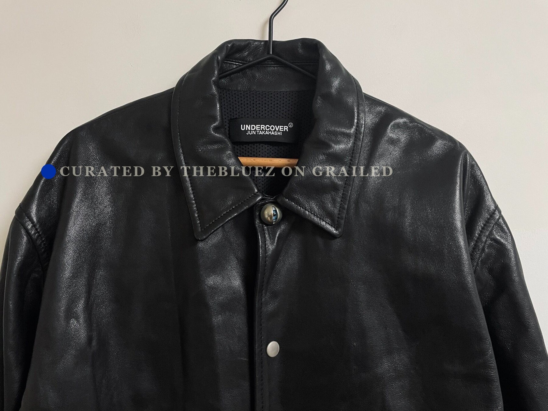 UNDERCOVER Eye Button Oversized Leather Jacket