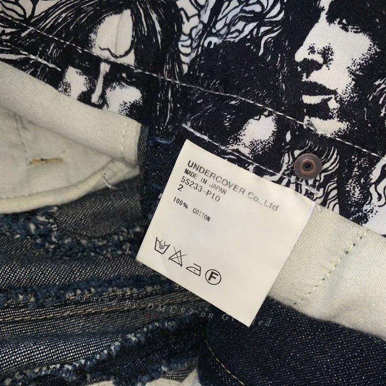 Undercover Split Cut Washed Jeans