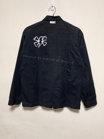 Undercover KAWS Collab Spliced Jacket