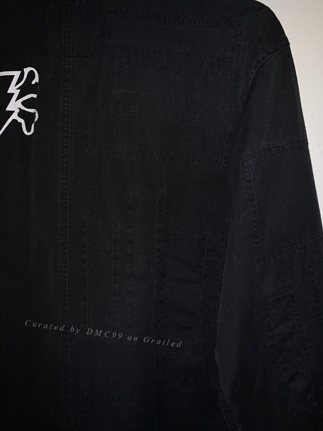 Undercover KAWS Collab Spliced Jacket