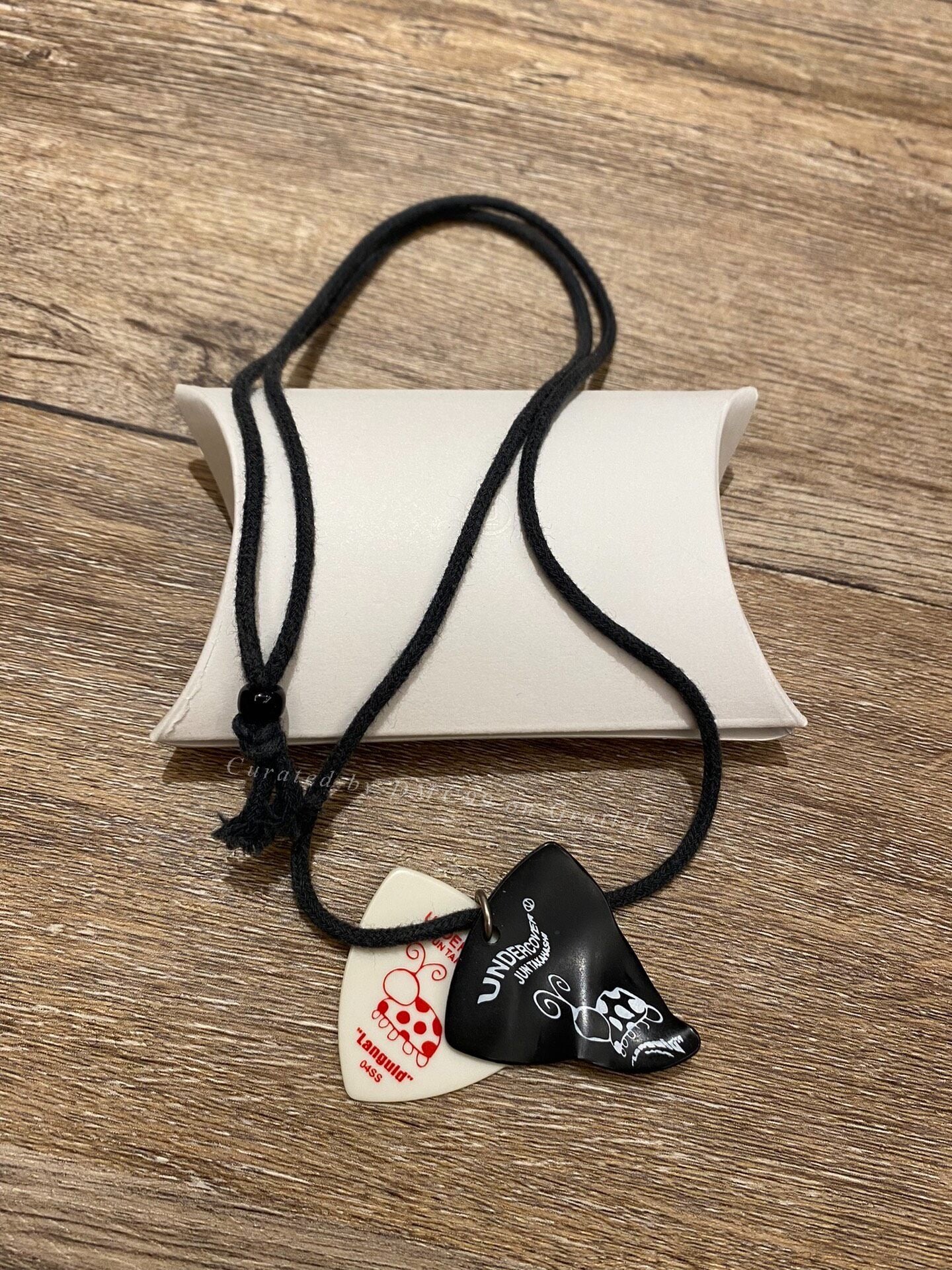 Undercover 04SS Dissolved Guitar Pick Necklace