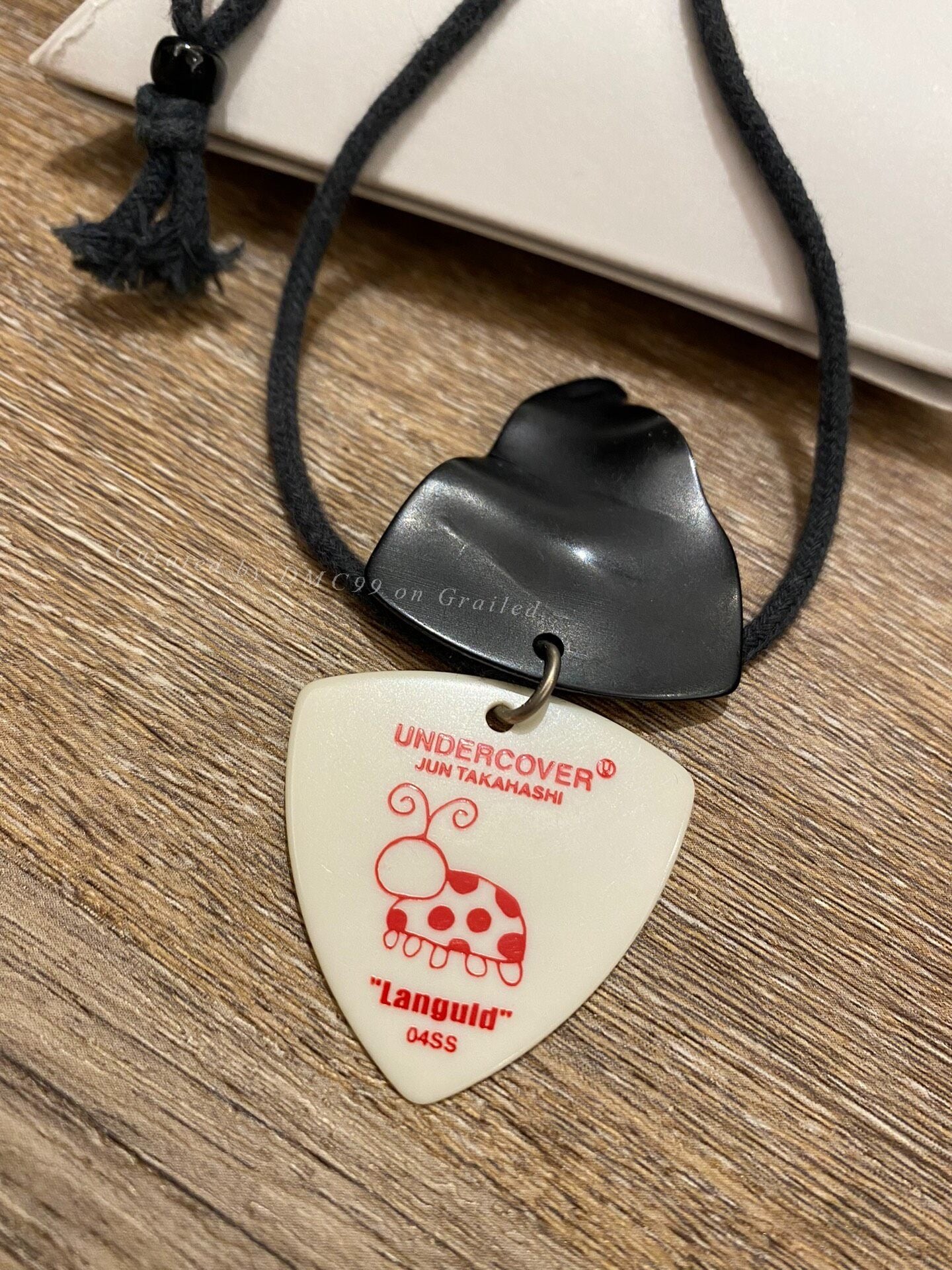 Undercover 04SS Dissolved Guitar Pick Necklace